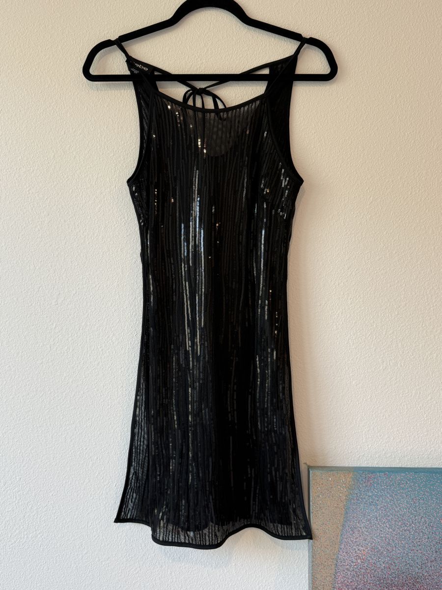 Brand new BEBE sheer black sequin dress.